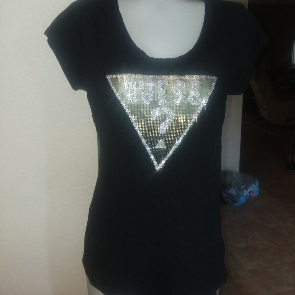Women tshirt by guess size XL